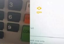 Vídeo mostra homem usando arma para votar em Flávio Bolsonaro
